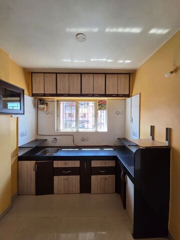 Kitchen in 2 BHK Apartment at Shreepad Savitri Audumbar, Dhayari – for Sale
