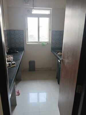 Bathroom in 1 BHK Apartment at Lodha Amara, Kolshet Road – for Rent