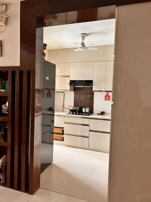 Kitchen in 4 BHK Apartment at Amrapali Heartbeat City, Sector 107 – for Rent