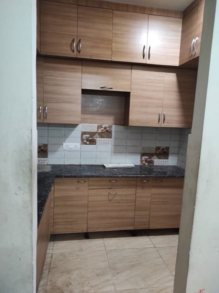 Kitchen, godrej-golf-links-evoke 3.5 Bedroom 1888 Sq.Ft. Apartment In Sector 27 Yamuna Expressway Greater Noida 10130760