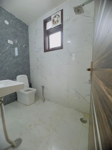 Bathroom in 3 BHK Apartment at Palm Residency Chhatarpur, Chattarpur – for Rent