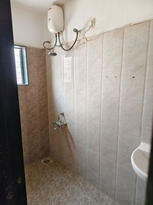 Bathroom in 2 BHK Apartment at Wadgaon Sheri – for Rent