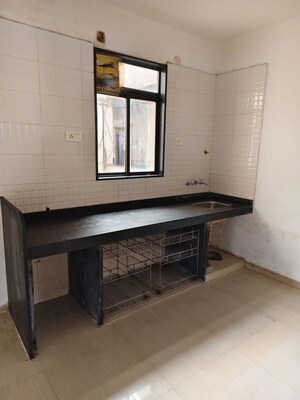 Kitchen in 2 BHK Apartment at Wadgaon Sheri – for Rent