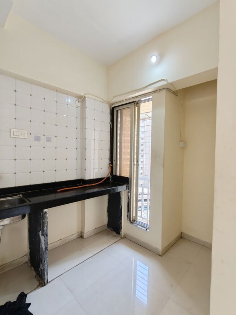 Kitchen, seven-apna-ghar-phase-2-plot-b 1 RK 260 Sq.Ft. Apartment In Mira Road Thane 10130893