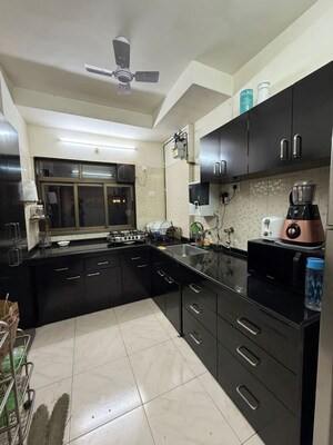 Kitchen in 2 BHK Apartment at Golden Sands CHS, Andheri West – for Rent