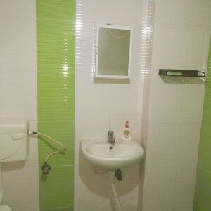 Bathroom in 3 BHK Apartment at Sri Sai Acropolis, Hosur Road – for Rent