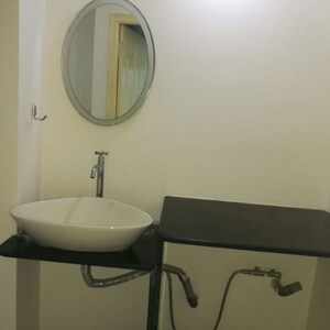 Bathroom in 3 BHK Apartment at Sri Sai Acropolis, Hosur Road – for Rent