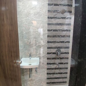 Bathroom in 2 BHK Apartment at Sunteck City Avenue 4, Goregaon West – for Rent