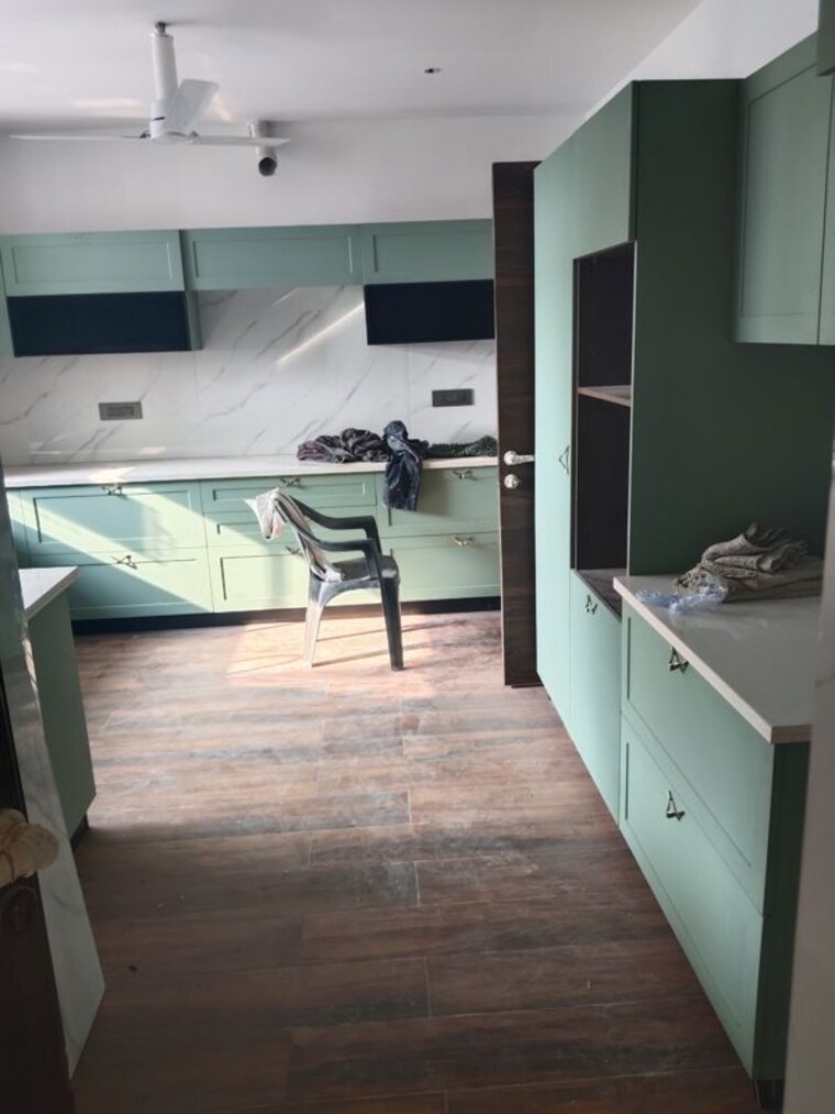 Kitchen, unitech-uniworld-resorts-the-residences 5 Bedroom 6850 Sq.Ft. Villa In Sector 33 Gurgaon 10129790