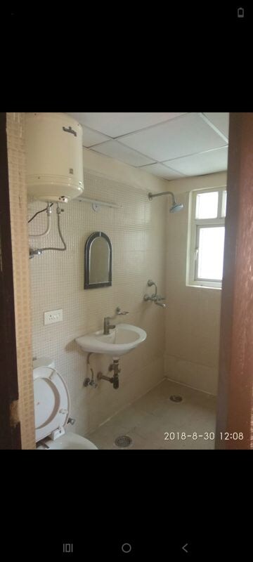 Bathroom in 2.5 BHK Apartment at Antriksh Golf View, Sector 78 – for Rent