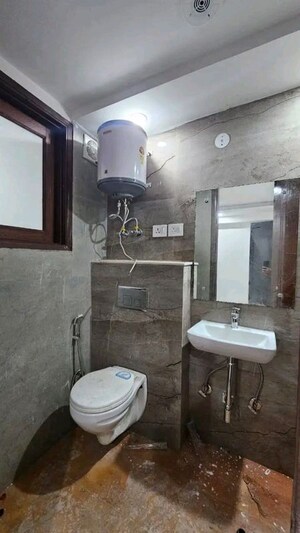 Bathroom in 2 BHK Apartment at Palm Residency Chhatarpur, Chattarpur – for Rent