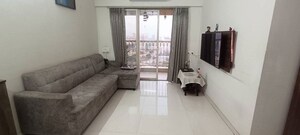 Living Room in 1 BHK Apartment at Rutu City, Thane West – for Rent