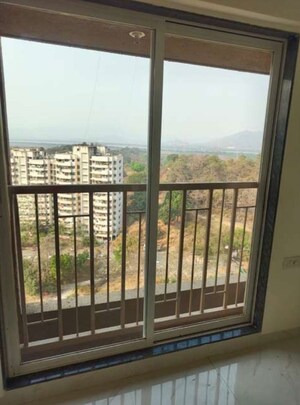 Balcony in 1 BHK Apartment at Metropolis Bayside, Kasarvadavali – for Sale