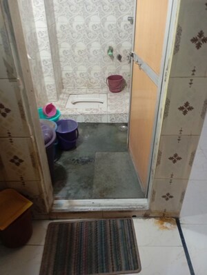 Bathroom in 1 RK Apartment at Bhawani Gujar CHS, Andheri East – for Sale