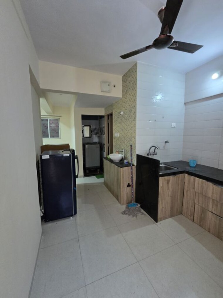 Kitchen, wadgaon sheri 3 Bedroom 1000 Sq.Ft. Apartment In Wadgaon Sheri Pune 10131393