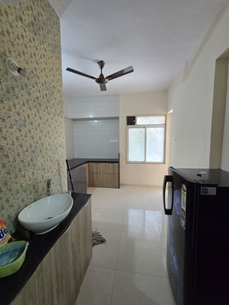 Kitchen, wadgaon sheri 3 Bedroom 1000 Sq.Ft. Apartment In Wadgaon Sheri Pune 10131393