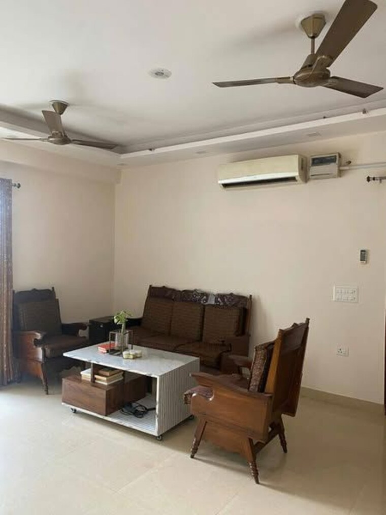 Living Room, amrapali-golf-homes 2 Bedroom 835 Sq.Ft. Apartment In Sector 4 Greater Noida Greater Noida 9293451