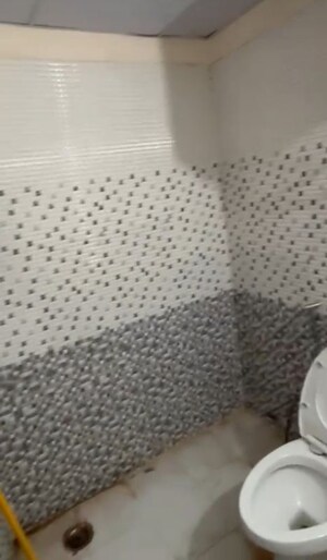 Bathroom in 2 BHK Apartment at Mehak Jeevan, Raj Nagar Extension – for Sale