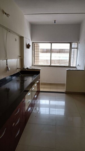Kitchen in 3 BHK Apartment at Kumar Park Infinia, Fursungi – for Sale