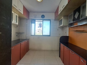 Kitchen in 2 BHK Apartment at Prakruti Park, Brahmand – for Sale