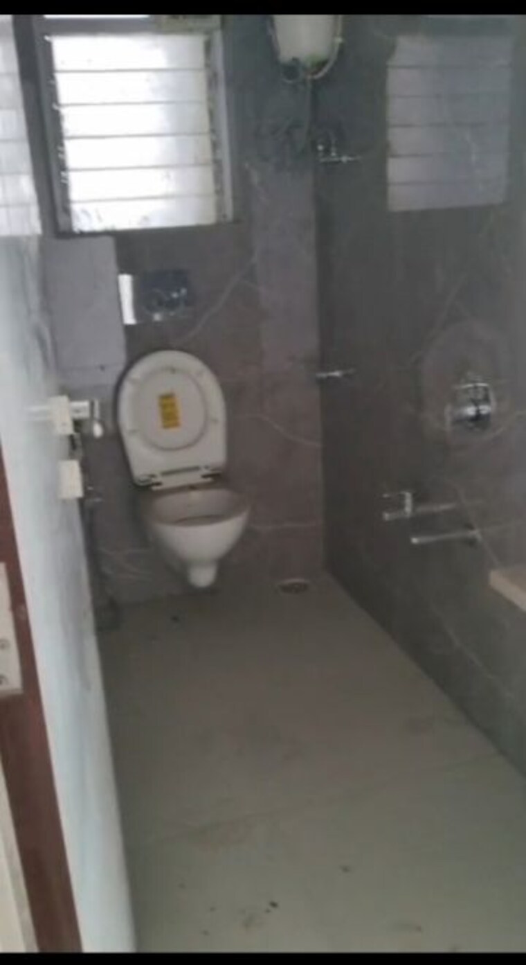 Bathroom, mira road 2 Bedroom 650 Sq.Ft. Apartment In Mira Road Thane 10131508