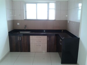 Kitchen in 2 BHK Apartment at Paranjape Forest Trails Pebbles, Bhugaon – for Rent