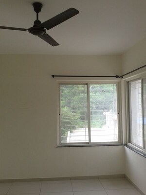 Room in 2 BHK Apartment at Paranjape Forest Trails Pebbles, Bhugaon – for Rent