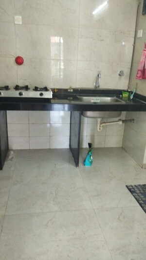 Kitchen in 2 BHK Apartment at Rama Melange Residences, Hinjewadi – for Rent
