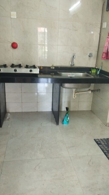 Kitchen in 2 BHK Apartment at Rama Melange Residences, Hinjewadi – for Rent