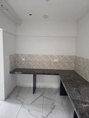 Kitchen in 2 BHK Apartment at Rahul Downtown, Punawale – for Sale