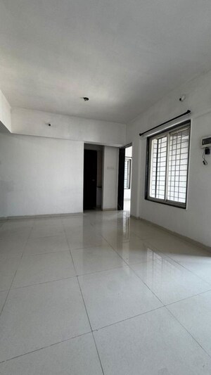 Living Room in 1 BHK Apartment at Padmanabh Golden Valley, Dhayari – for Sale