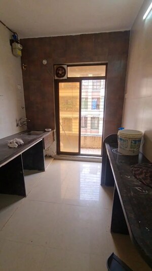 Kitchen in 2 BHK Apartment at Mangalmurti Dham, Belawali – for Rent