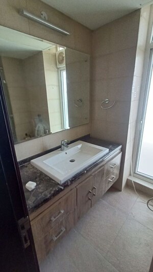 Bathroom in 3 BHK Apartment at Mahindra Luminare, Sector 59 – for Rent