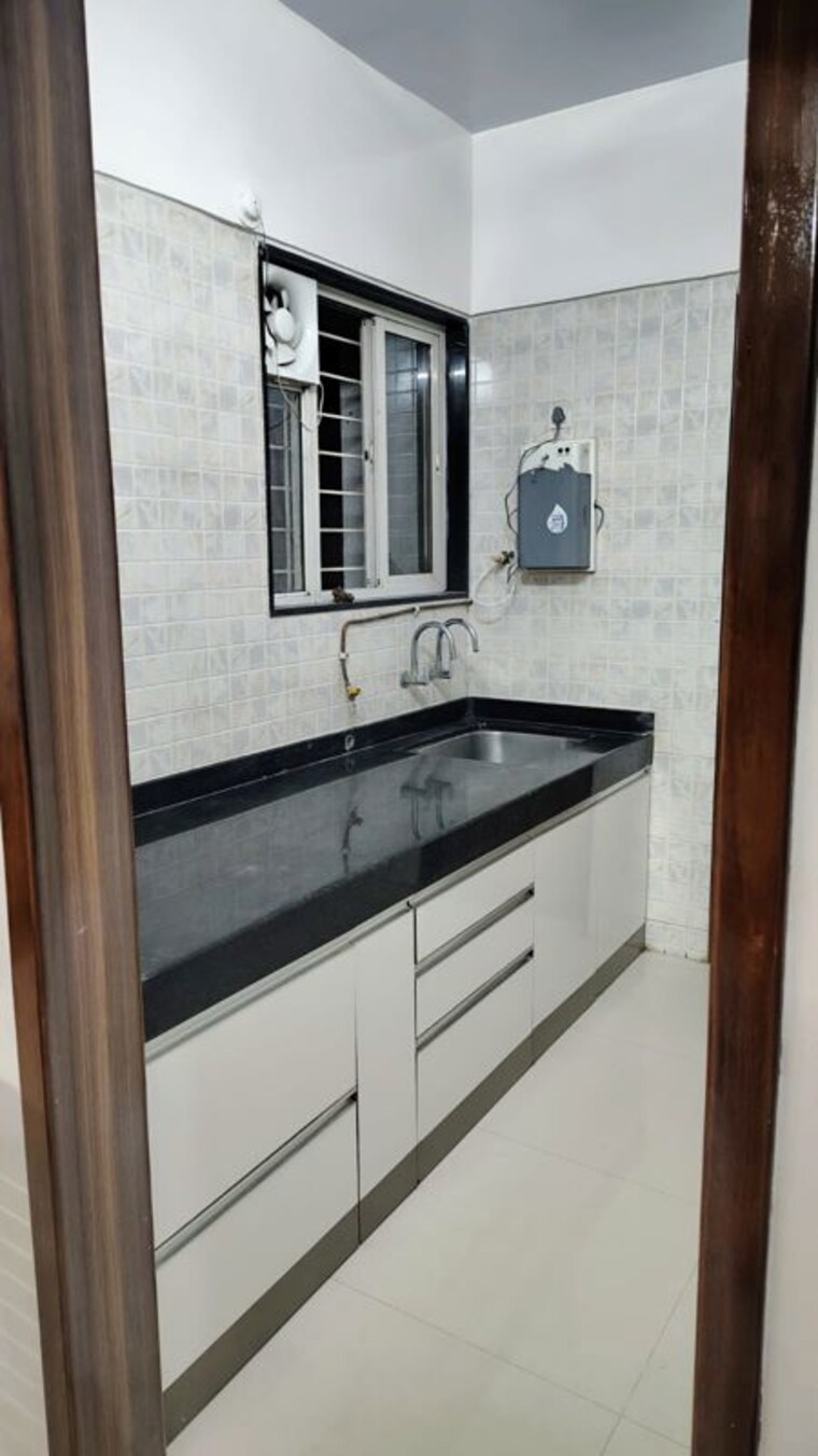 Kitchen, millennium-acropolis 2 Bedroom 760 Sq.Ft. Apartment In Wakad Pune 10131700