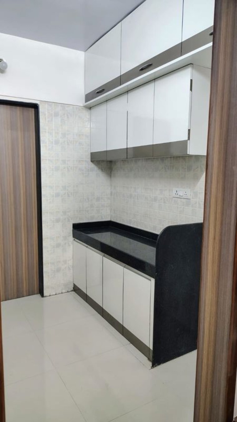 Kitchen, millennium-acropolis 2 Bedroom 760 Sq.Ft. Apartment In Wakad Pune 10131700