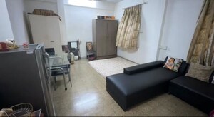 Living Room in 2 BHK Apartment at Shri Ramakrishna CHS, Vile Parle West – for Rent