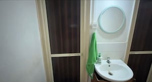 Bathroom in 2 BHK Apartment at Shri Ramakrishna CHS, Vile Parle West – for Rent