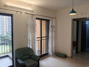 Living Room in 2 BHK Apartment at Shapoorji Pallonji Joyville Hinjewadi, Hinjewadi – for Rent