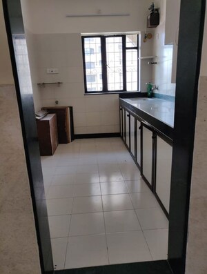 Kitchen in 2 BHK Apartment at Girdhar Park, Malad West – for Sale