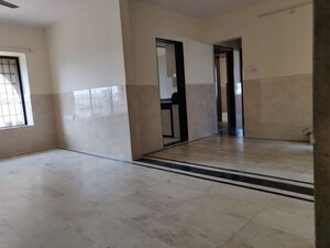 Living Room in 2 BHK Apartment at Girdhar Park, Malad West – for Sale