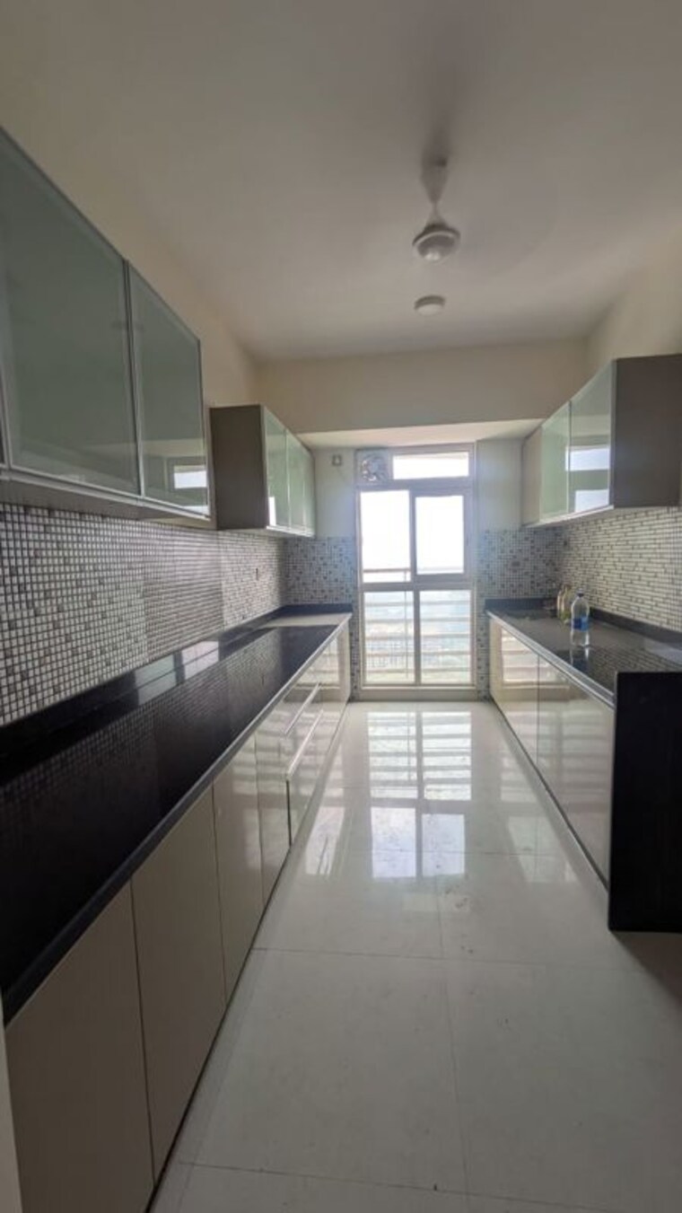 Kitchen, omkar-veda-exclusive 2 Bedroom 850 Sq.Ft. Apartment In Parel Mumbai 10131862