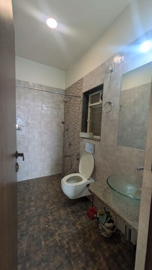 Bathroom in 2 BHK Apartment at Omkar Veda Exclusive, Parel – for Rent