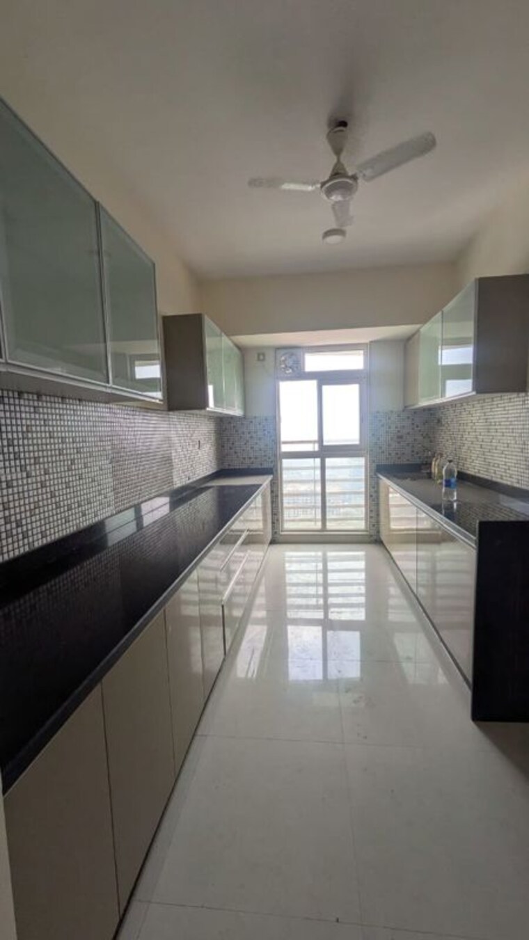 Kitchen, omkar-veda-exclusive 2 Bedroom 850 Sq.Ft. Apartment In Parel Mumbai 10131862