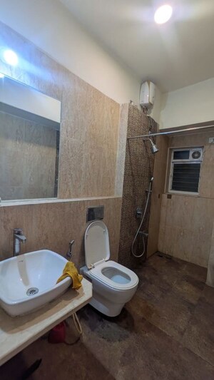 Bathroom in 2 BHK Apartment at Omkar Veda Exclusive, Parel – for Rent