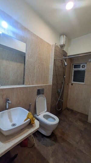 Bathroom in 2 BHK Apartment at Omkar Veda Exclusive, Parel – for Rent