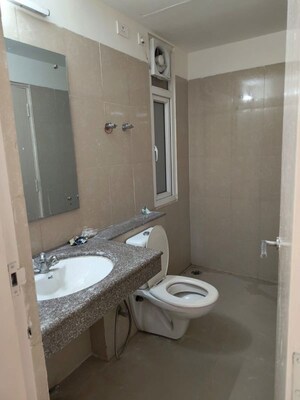 Bathroom in 3 BHK Apartment at Emaar Palm Hills, Sector 77 – for Sale