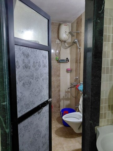 Bathroom in 2 BHK Apartment at Ganga Panchavati CHS, Vasant Vihar – for Rent