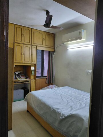 Bedroom in 2 BHK Apartment at Ganga Panchavati CHS, Vasant Vihar – for Rent