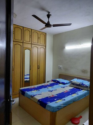 Bedroom in 2 BHK Apartment at Ganga Panchavati CHS, Vasant Vihar – for Rent