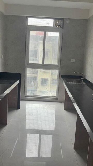 Kitchen in 2 BHK Apartment at Tricity Montview, Sanpada – for Sale